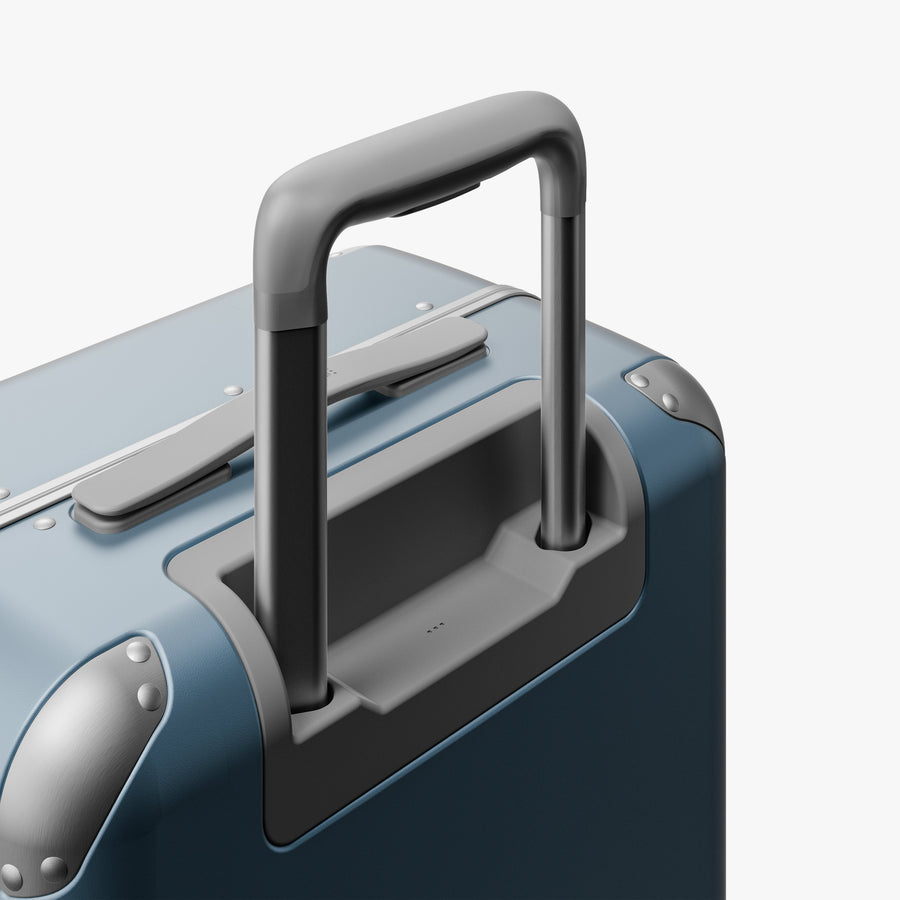 Elemental Blue | Extended luggage handle view of Hybrid Carry-On Plus in Elemental Blue