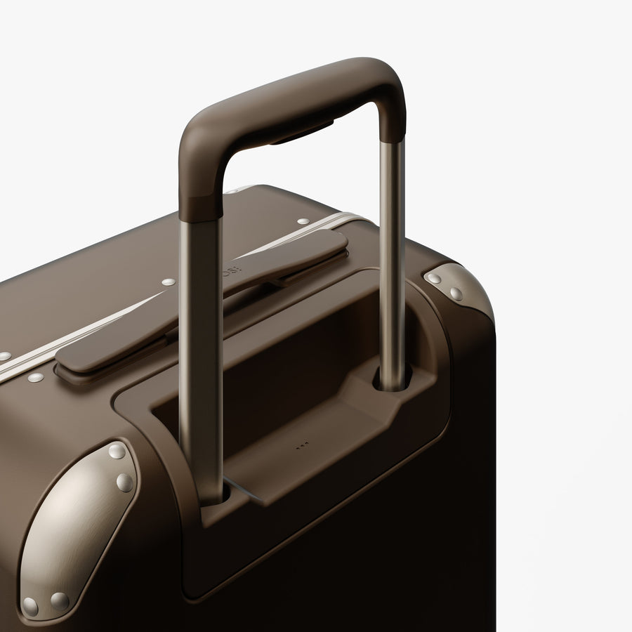 Adobe Brown | Extended luggage handle view of Hybrid Carry-On in Adobe Brown