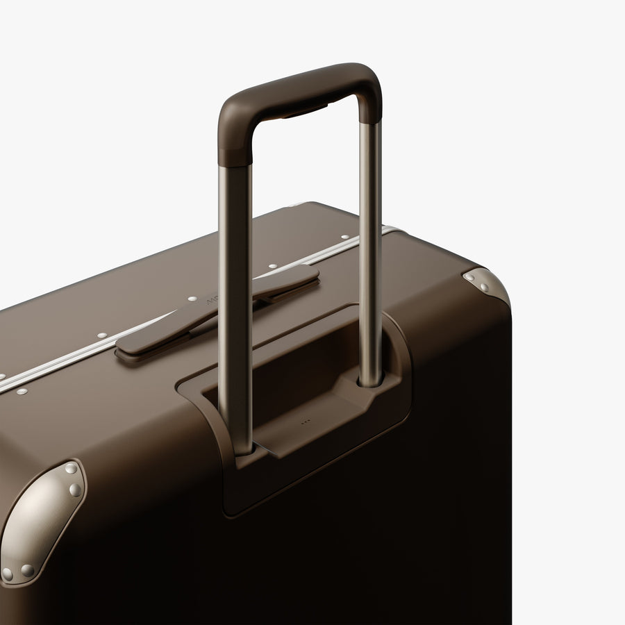 Adobe Brown | Extended luggage handle view of Hybrid Check-In Large in Adobe Brown