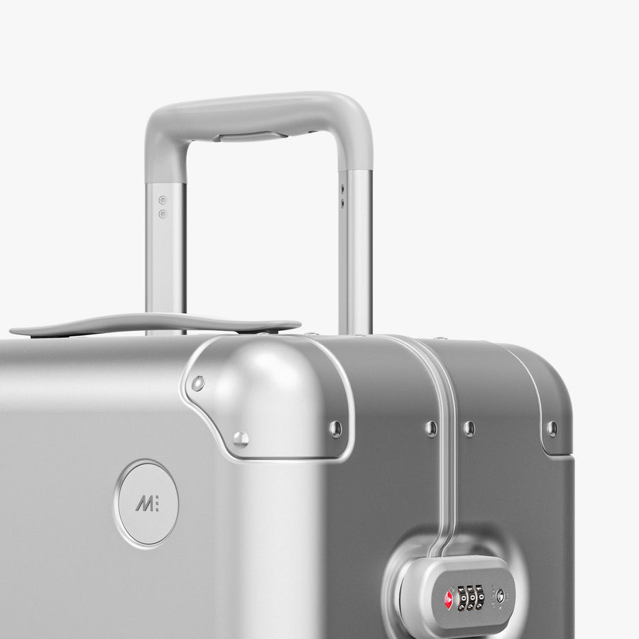 Aspen Silver | Luggage handle view of Aluminum Check-In Medium in Aspen Silver