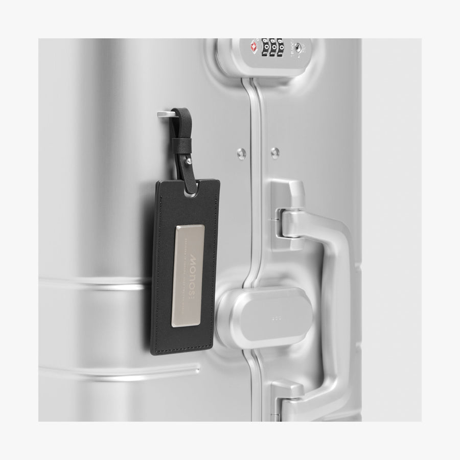 Aspen Silver | Luggage tag view of Aluminum Check-In Large in Aspen Silver