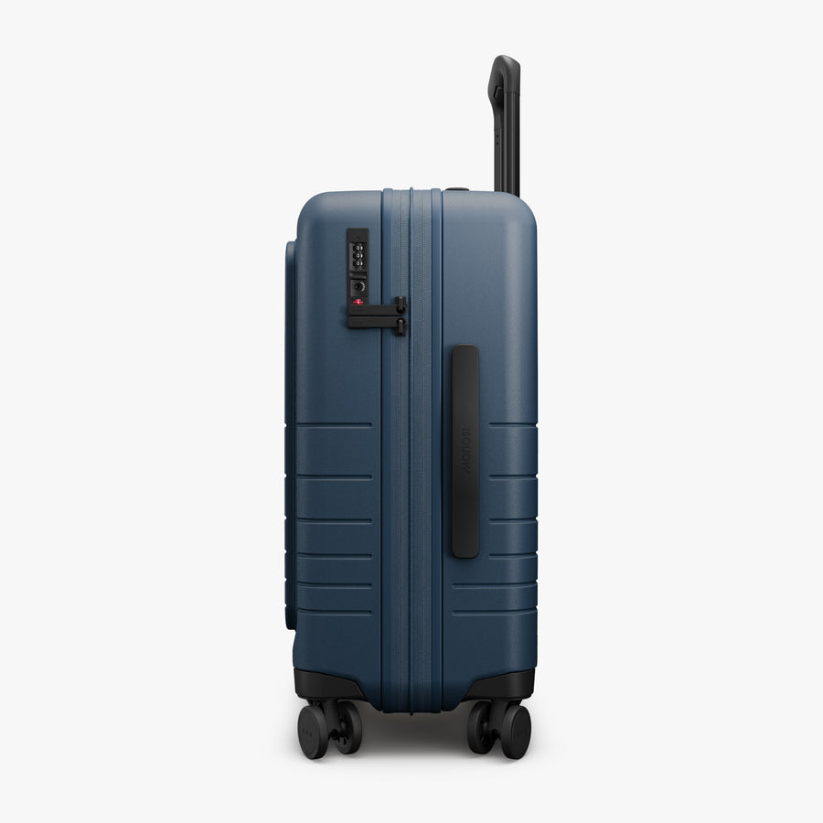 Ocean Blue | Side view of Expandable Carry-On Pro in Ocean Blue