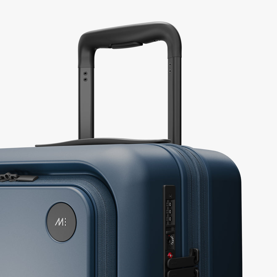 Ocean Blue | Luggage handle view of Expandable Carry-On Pro in Ocean Blue