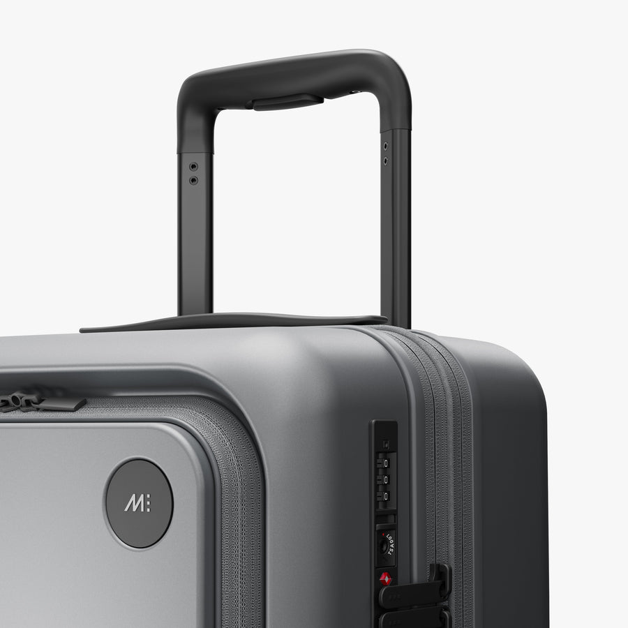Storm Grey | Luggage handle view of Expandable Carry-On Pro in Storm Grey