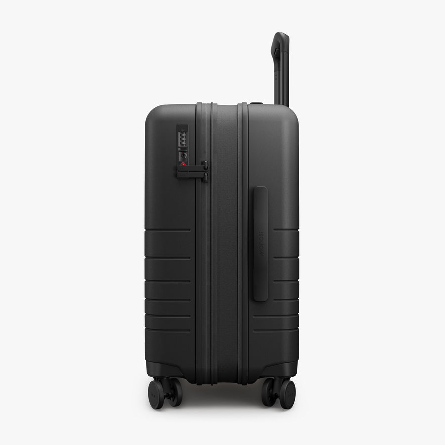 Midnight Black | Expanded zipper view of Expandable Carry-On in Midnight Black