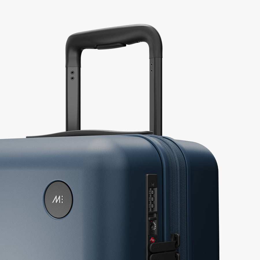 Ocean Blue | Luggage handle view of Expandable Carry-On in Ocean Blue