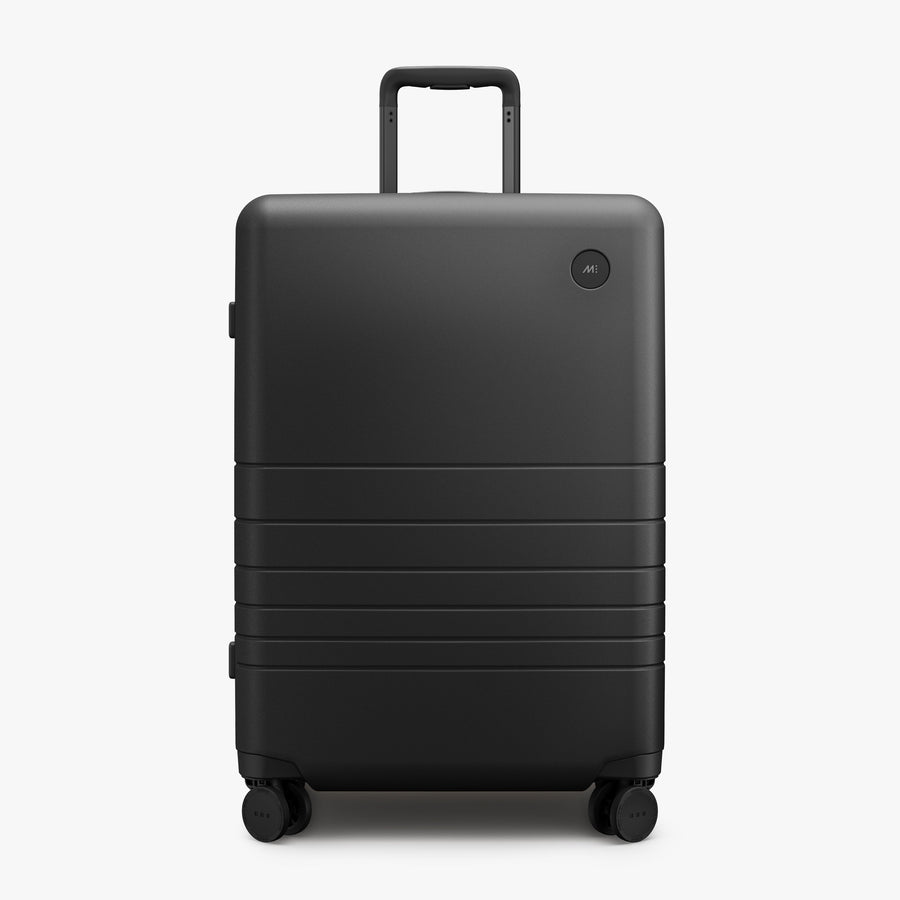 Midnight Black | Front view of Expandable Check-In Medium in Midnight Black