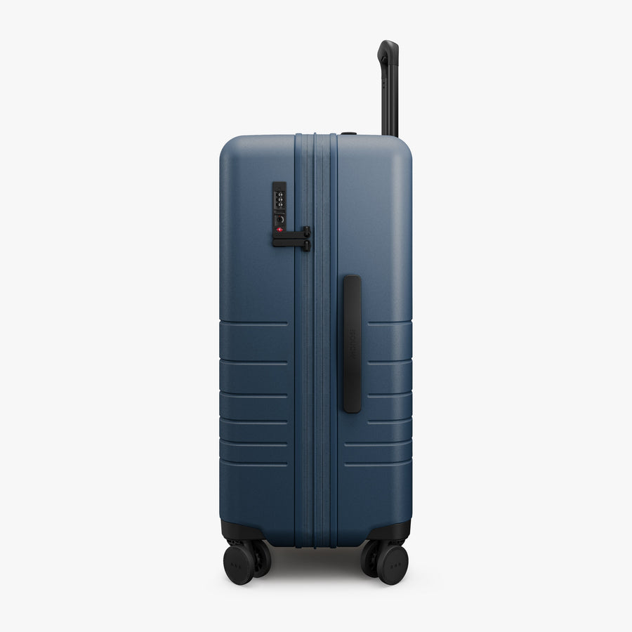 Ocean Blue | Side view of Expandable Check-In Medium in Ocean Blue