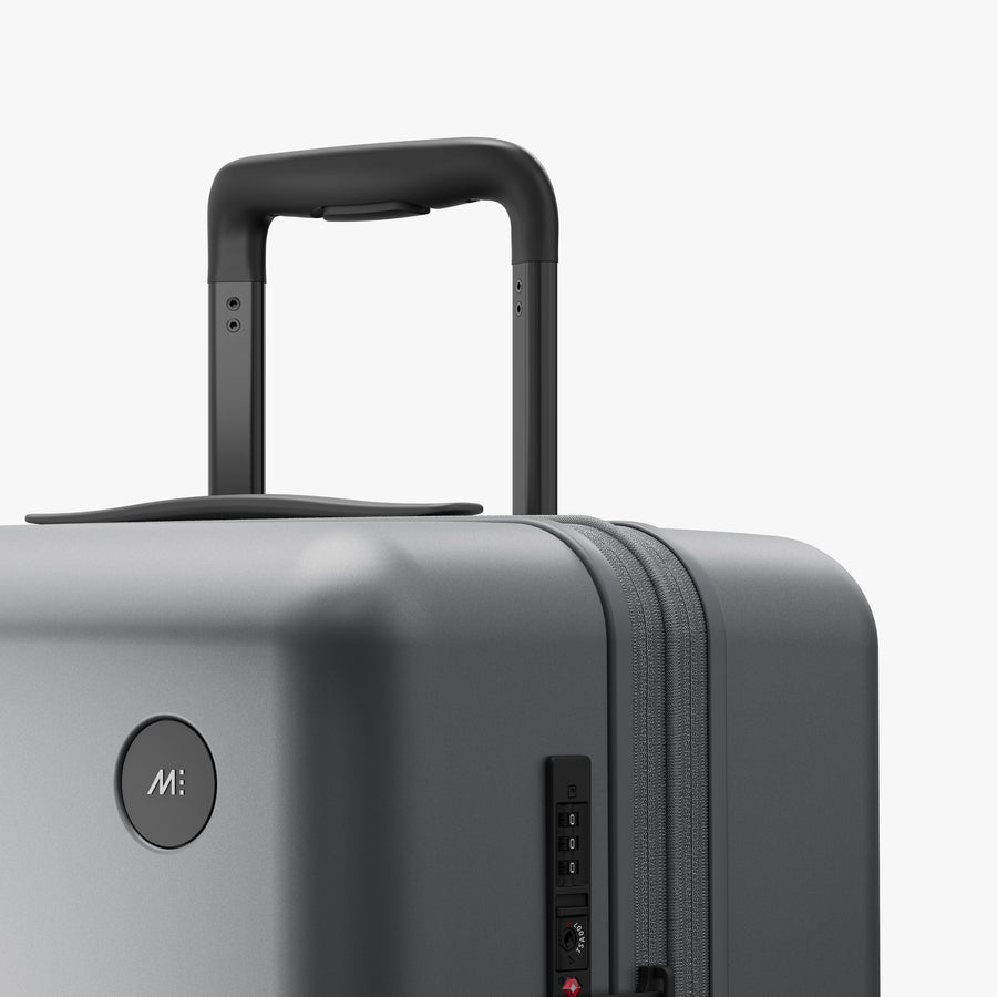Storm Grey | Luggage handle view of Expandable Check-In Medium in Storm Grey