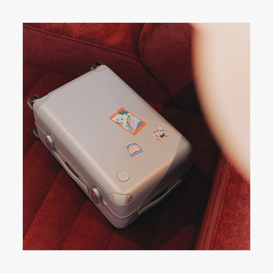 New York | All three stickers of New York stickers set on a laying suitcase
