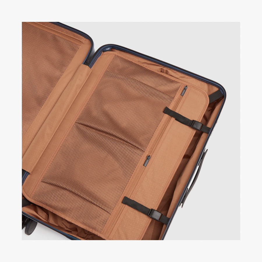 Arles Blue (Glossy) | Compression Pocket inside view of Check-In Medium in Arles Blue