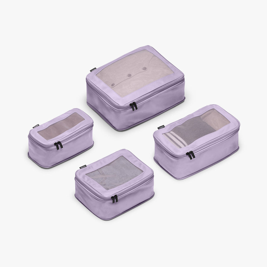 Set of Four / Purple Icing | This is a photo of a set of four compressible packing cubes in Purple Icing