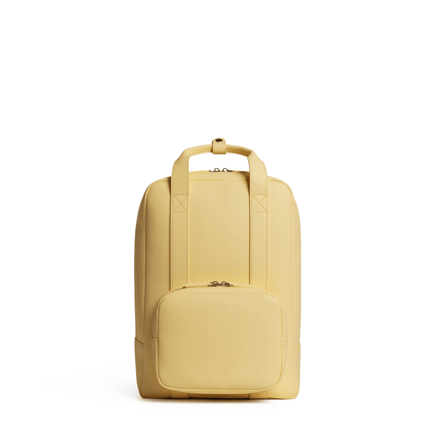 Banana Pudding (Vegan Leather) Scaled | Front view of Metro Backpack Banana Pudding