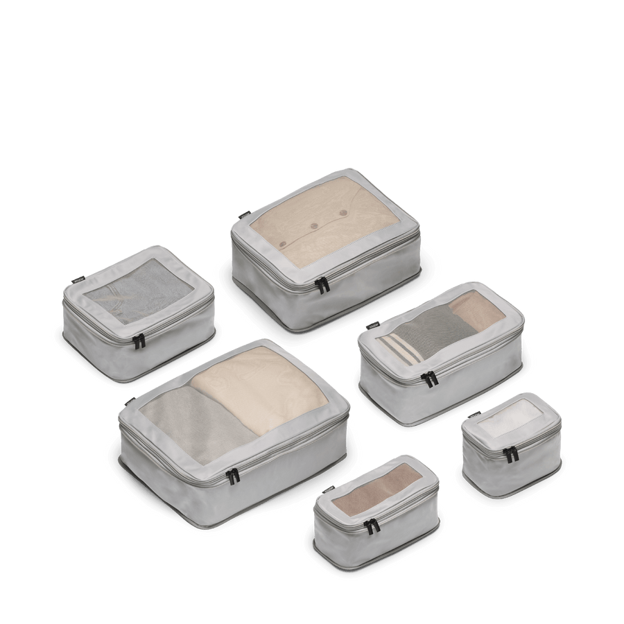 Set of Six / Grey Scaled | This is a photo of a set of six compressible packing cubes in grey