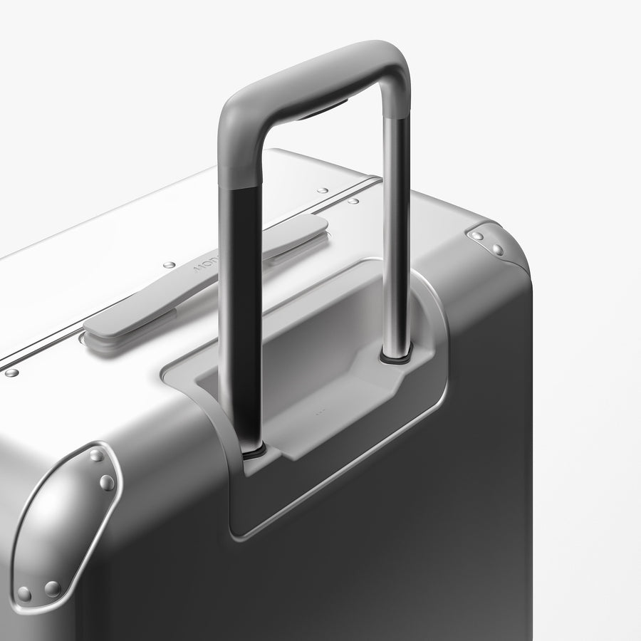 Silver | Extended luggage handle view of Hybrid Check-In Medium in Silver