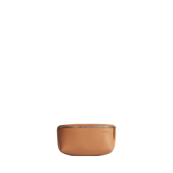 Saddle Tan (Vegan Leather) Scaled | Front view of Metro Sling in Saddle Tan